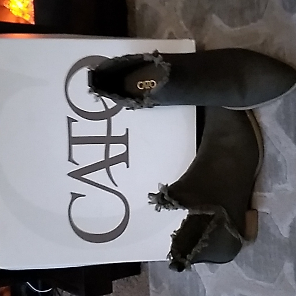 Olive booties, not sure if it's leather or suede, but beautiful true olive color